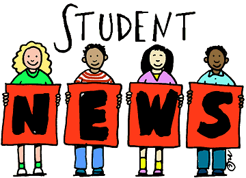 4 students holding news sign