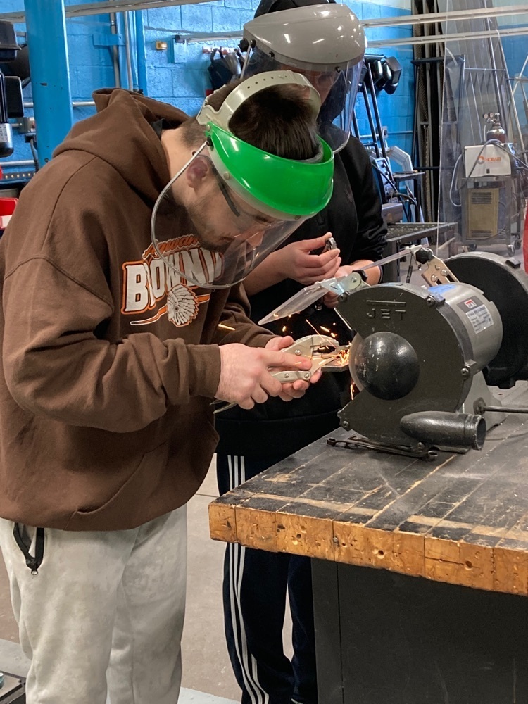 welding student making a ring